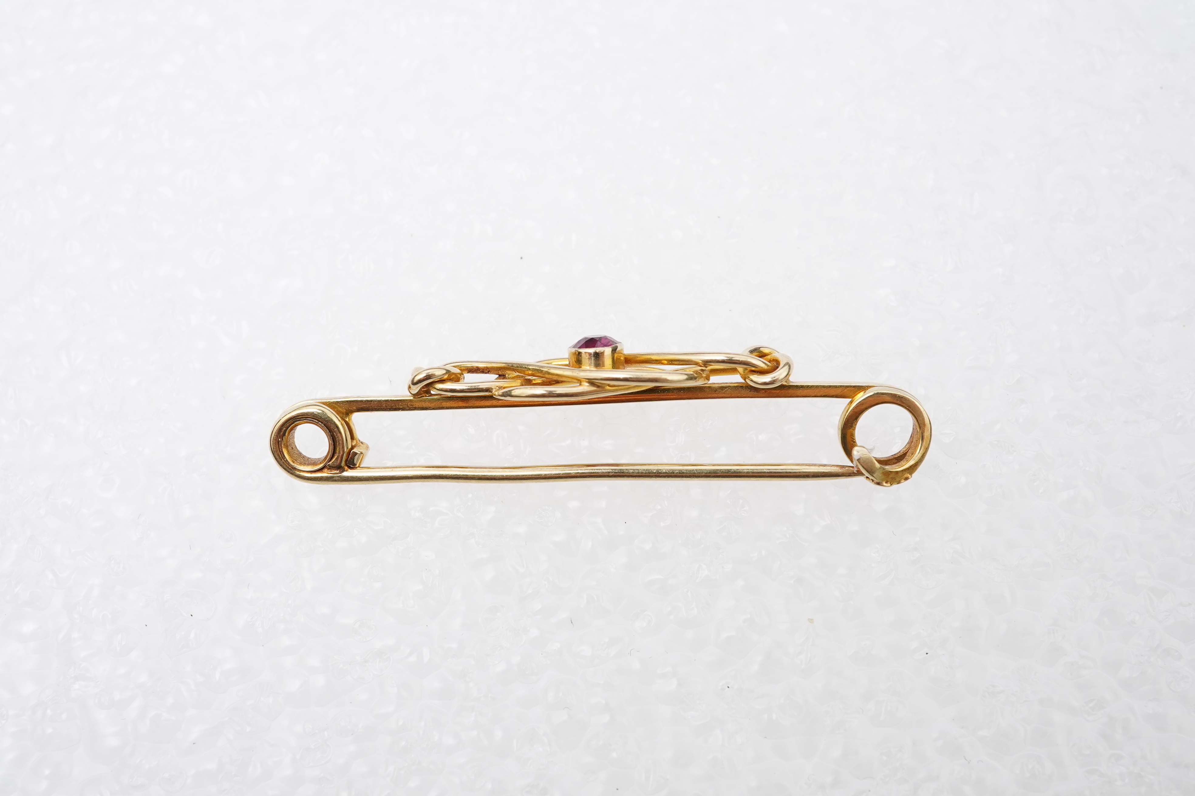 A late Victorian garnet brooch, circa 1900